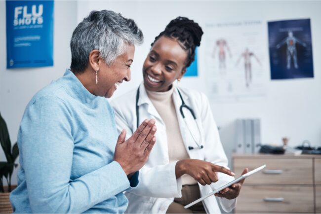 A doctor talking to a female patient.