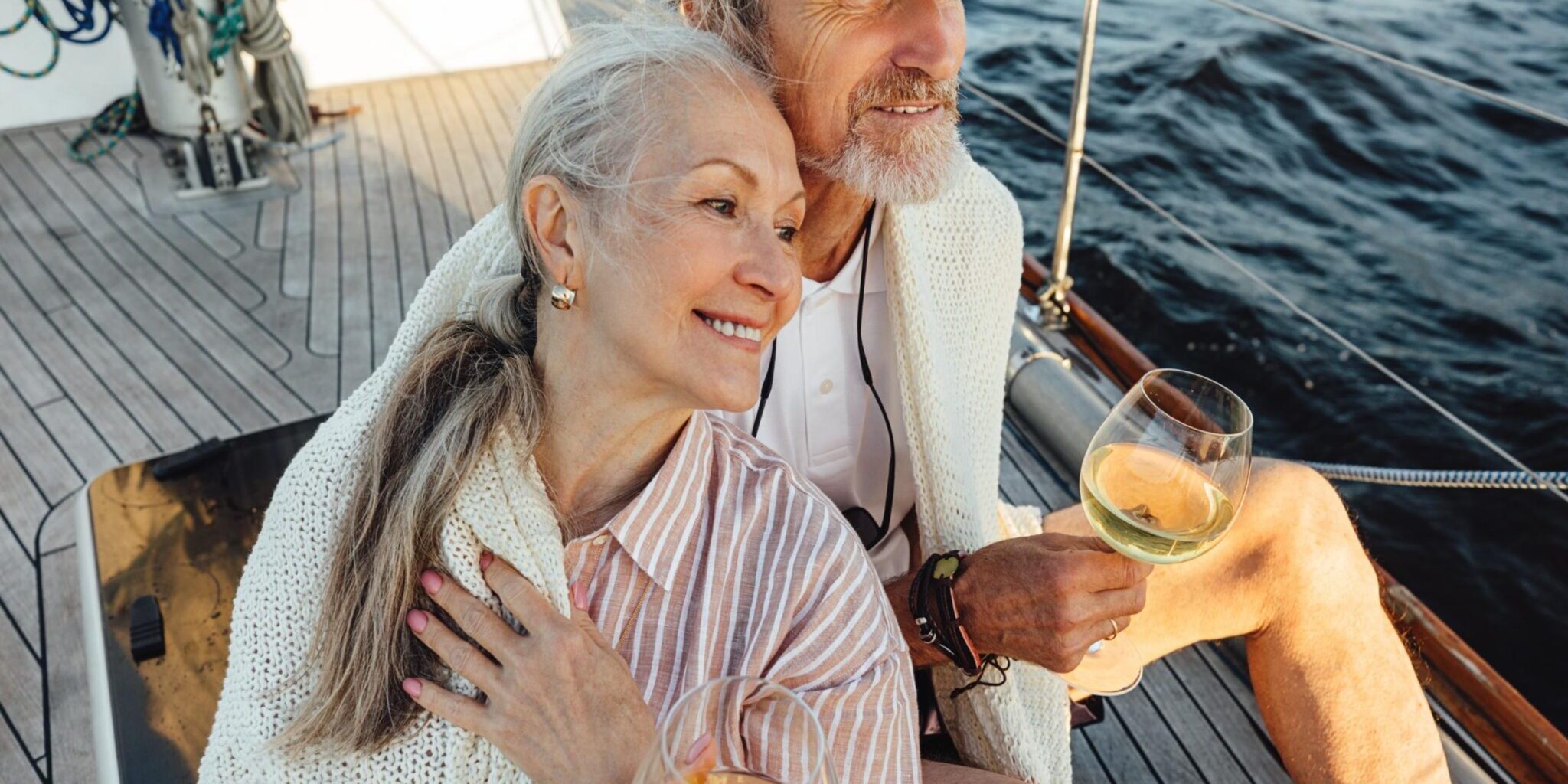 Blog 6 A couple sitting on a yacht deck.