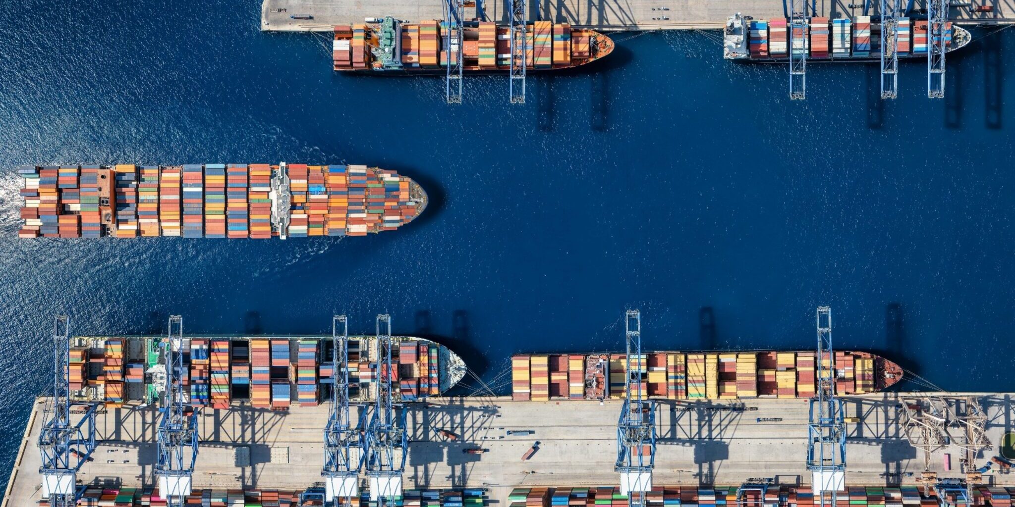An aerial view of a cargo ship harbour.