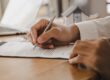 A man checking paperwork.